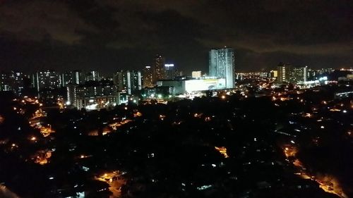 Illuminated cityscape at night