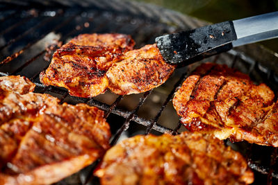 Close-up of meat on barbecue grill