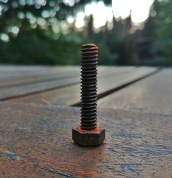 Close-up of rusty metal on table