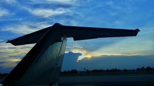 Low angle view of building against cloudy sky