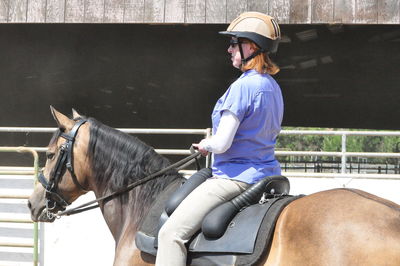 Woman riding horse