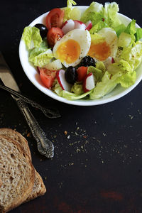 High angle view of breakfast served on table