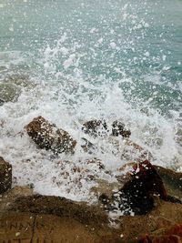 Waves splashing on rocks