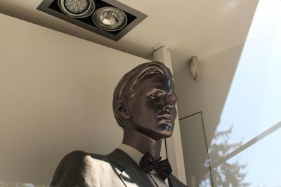 Low angle view of male mannequin 