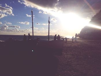 Silhouette of people on beach