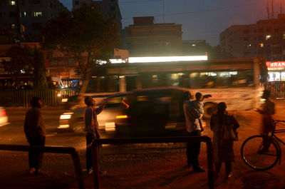 People on street at night