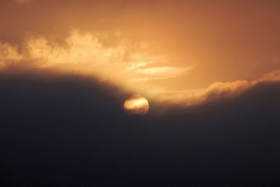 Scenic view of moon at sunset