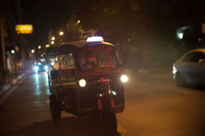 Cars on road at night