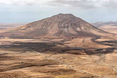 Scenic view of desert against sky