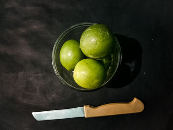 High angle view of fruits in bowl on table