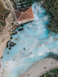 High angle view of swimming pool by sea