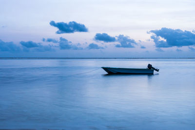 Boat in sea against sky