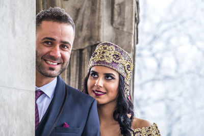 Bride with bridegroom during weeding ceremony