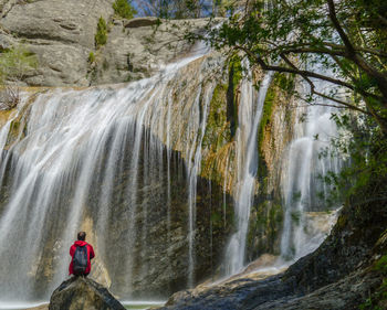 View of waterfall in forest