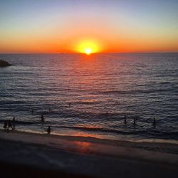 Scenic view of sea at sunset