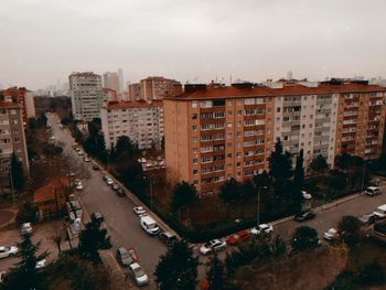 High angle view of street amidst buildings in city