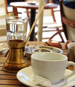 Close-up of coffee cup on table