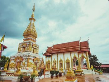 Temple outside building against sky