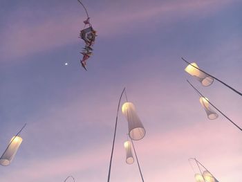 Low angle view of street light against sky