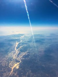 Aerial view of vapor trails in sky