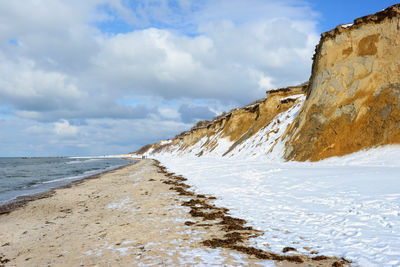 Scenic view of beach against sky