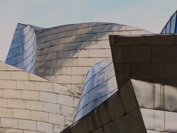 Low angle view of modern building against sky