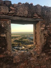 View of old ruin building against sky