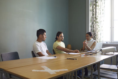 People in boardroom during business meeting