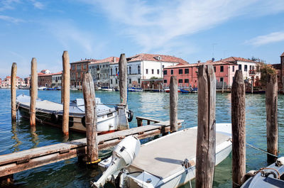 Boats moored in grand canal