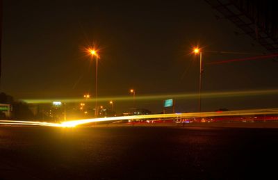 Light trails on road at night