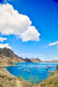 Scenic view of sea against blue sky