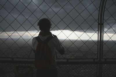 Woman standing against sky