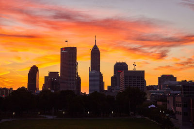 Cityscape against sky during sunset