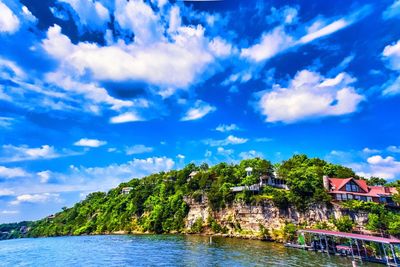 Scenic view of calm sea against cloudy sky