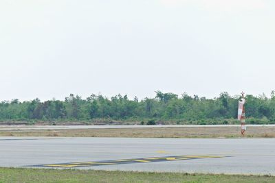 Scenic view of land against clear sky