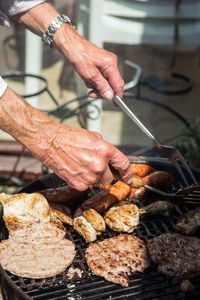 Close-up of man preparing food