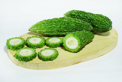 Close-up of green beans against white background