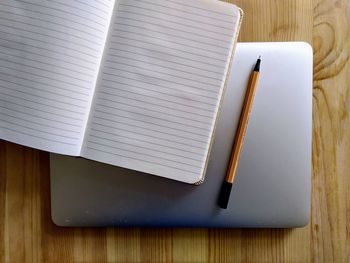 High angle view of book on table