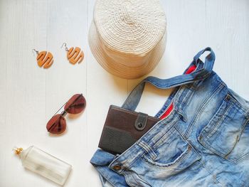High angle view of personal accessories on table