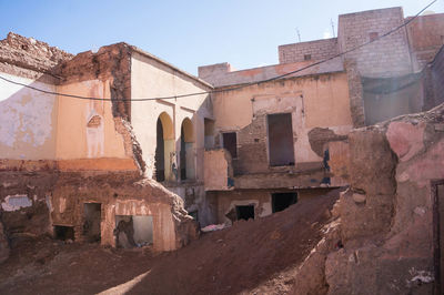 Old buildings against sky