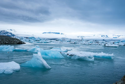 Beautiful icebergs floating in jokulsarlon glacier lagoon in polar climate