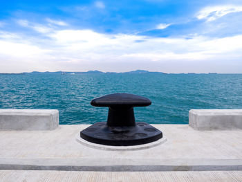 Pier over sea against sky