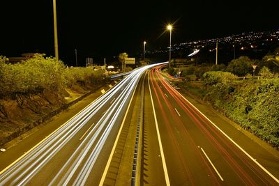 Light trails on road at night