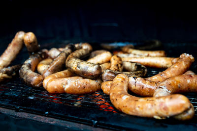 Close-up of meat on barbecue grill