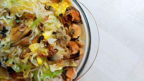 Directly above shot of noodles served on table