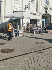 People on street in city