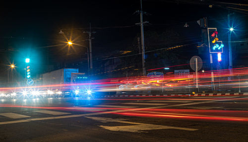 Light trails on city street at night