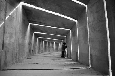 Boy standing in walkway