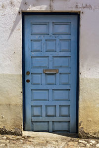 Blue door with mailbox