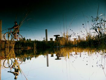 Scenic view of lake against clear sky